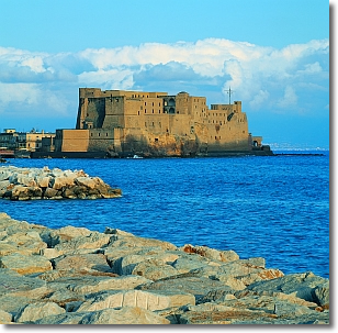 a castle surrounded by the water of the sea